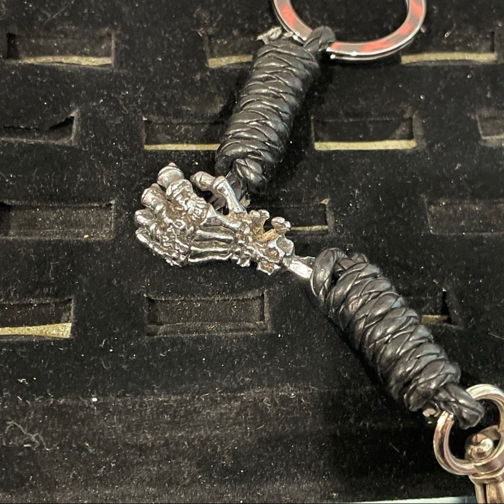 Skeleton hand and leather keychain